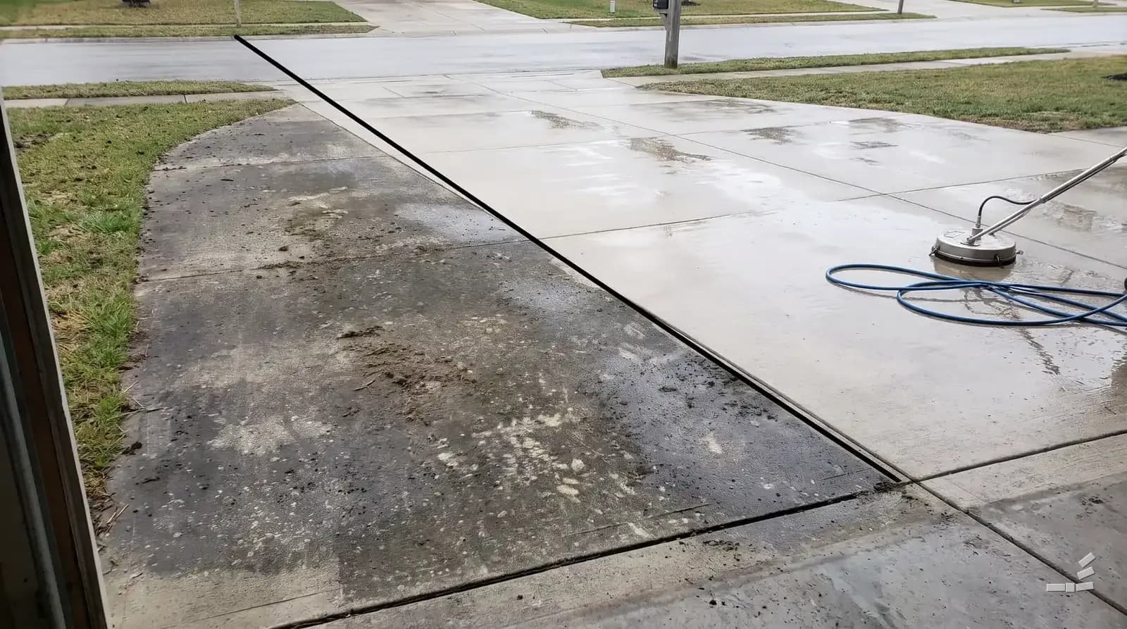 Photograph-style two-car driveway half cleaned along a diagonal